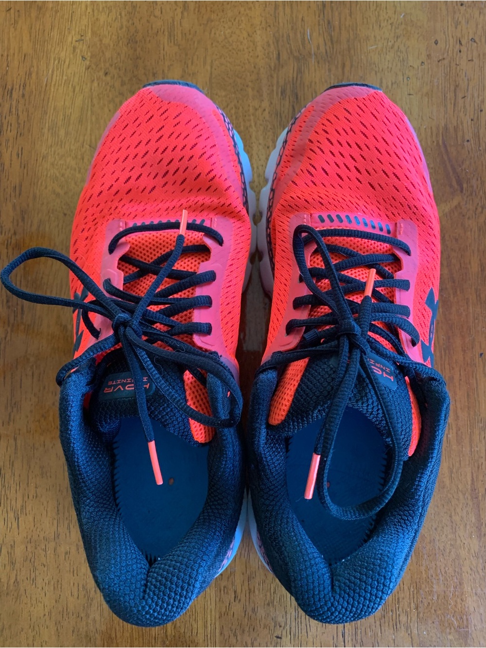 Under Armour Women’s Black and Bright Orange Performance Running Shoes